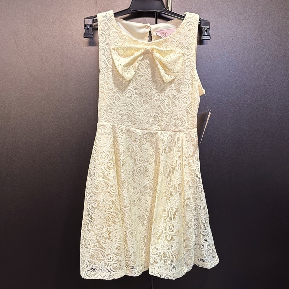 Duchess Lace Overlay, lined,bow-front,keyhole button back,sleeveless flowy dress